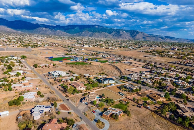 birds eye view of property featuring a mountain view and a residential view
