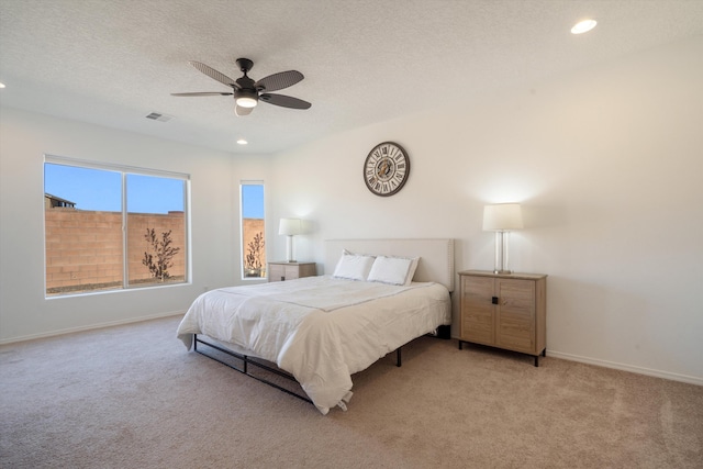 3003 Turquesa SE, Rio Rancho, NM 87124 - carpeted bedroom with recessed lighting, baseboards, ceiling fan, and a textured ceiling