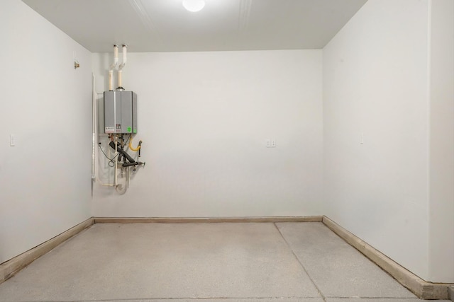 3003 Turquesa SE, Rio Rancho, NM 87124 - empty room with baseboards and tankless water heater