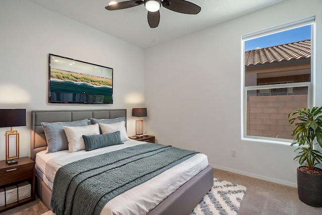 3003 Turquesa SE, Rio Rancho, NM 87124 - carpeted bedroom with baseboards and ceiling fan