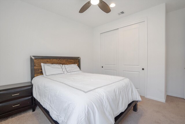 3003 Turquesa SE, Rio Rancho, NM 87124 - carpeted bedroom with a closet, baseboards, and a ceiling fan