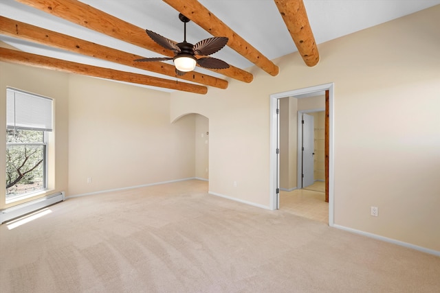 spare room with light carpet, baseboard heating, arched walkways, baseboards, and beamed ceiling