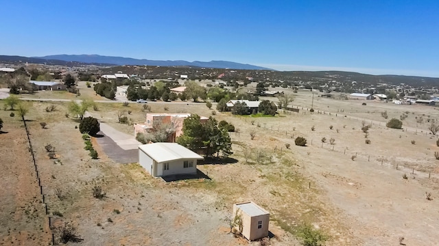 drone / aerial view featuring a mountain view