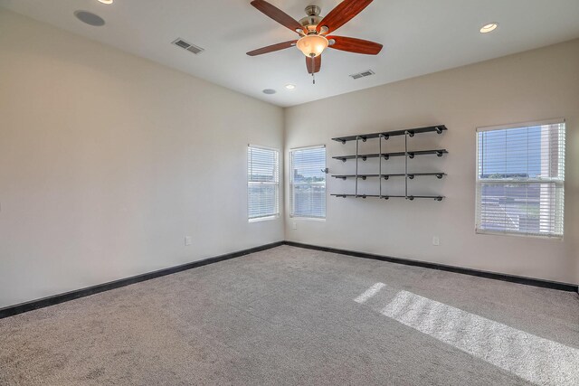 1797 Vargas Rd SE, Rio Rancho, NM 87124 - spare room with carpet, recessed lighting, and a ceiling fan