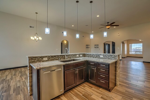1797 Vargas Rd SE, Rio Rancho, NM 87124 - kitchen featuring dishwasher, arched walkways, ceiling fan, light wood-type flooring, and recessed lighting