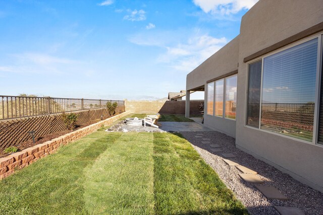 9109 Retablo Rd NW, Albuquerque, NM 87120 - view of yard with a patio area and a fenced backyard