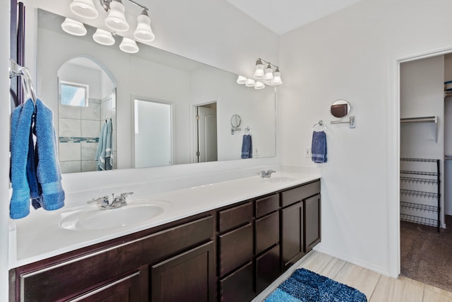 9109 Retablo Rd NW, Albuquerque, NM 87120 - full bath with a sink, a shower, and double vanity