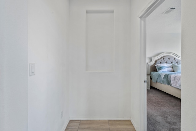 9109 Retablo Rd NW, Albuquerque, NM 87120 - hall featuring visible vents and baseboards