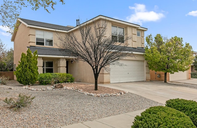 7419 Tolleson Ave NW, Albuquerque, NM 87114 - traditional-style house with driveway and stucco siding