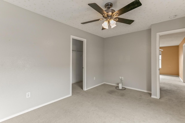 7419 Tolleson Ave NW, Albuquerque, NM 87114 - unfurnished bedroom featuring a spacious closet, baseboards, and carpet
