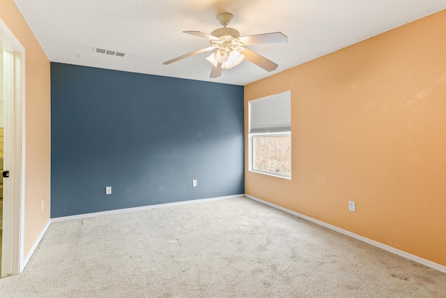 7419 Tolleson Ave NW, Albuquerque, NM 87114 - empty room with carpet flooring, baseboards, visible vents, and ceiling fan