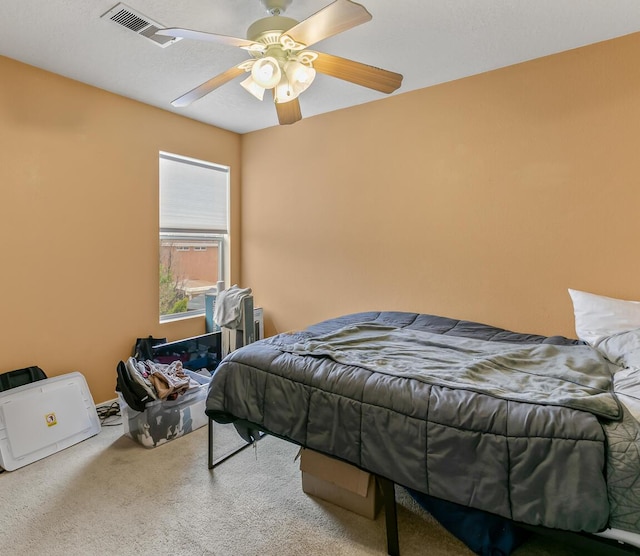 7419 Tolleson Ave NW, Albuquerque, NM 87114 - bedroom with visible vents, carpet flooring, and a ceiling fan