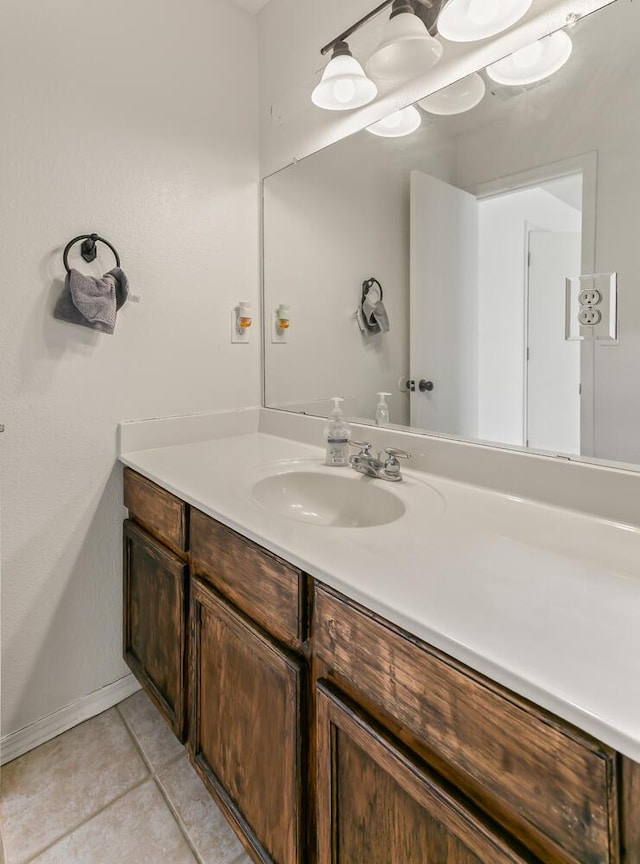 7419 Tolleson Ave NW, Albuquerque, NM 87114 - bathroom featuring vanity, baseboards, and tile patterned flooring