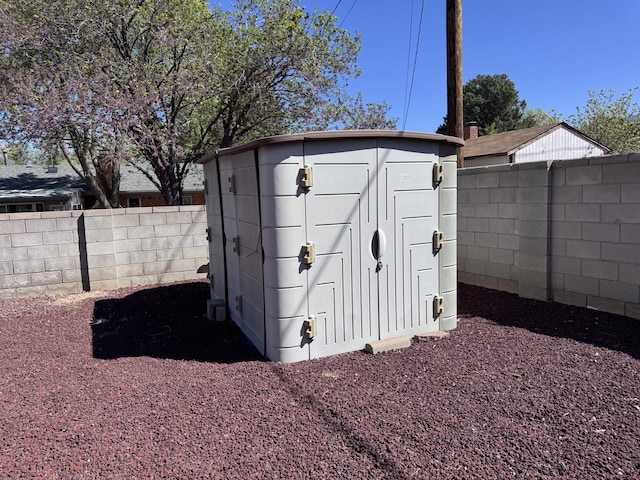 6329 Prairie Rd NE, Albuquerque, NM 87109 - view of shed with a fenced backyard
