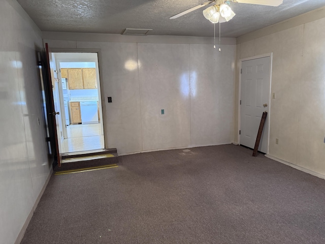 6329 Prairie Rd NE, Albuquerque, NM 87109 - unfurnished room featuring carpet, a textured ceiling, and ceiling fan