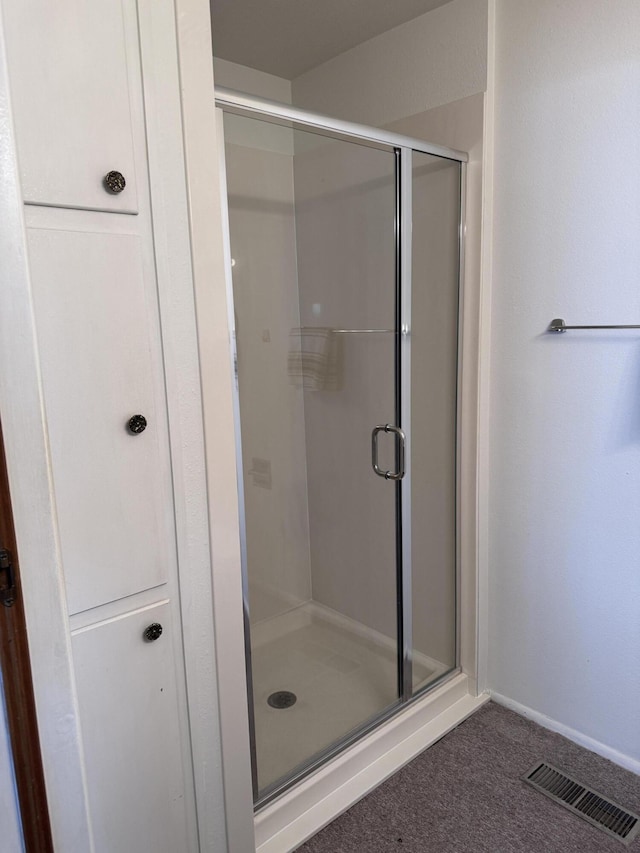 6329 Prairie Rd NE, Albuquerque, NM 87109 - full bath featuring baseboards, a shower stall, and visible vents