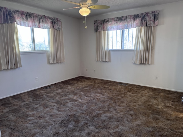 6329 Prairie Rd NE, Albuquerque, NM 87109 - carpeted spare room featuring baseboards, ceiling fan, and visible vents