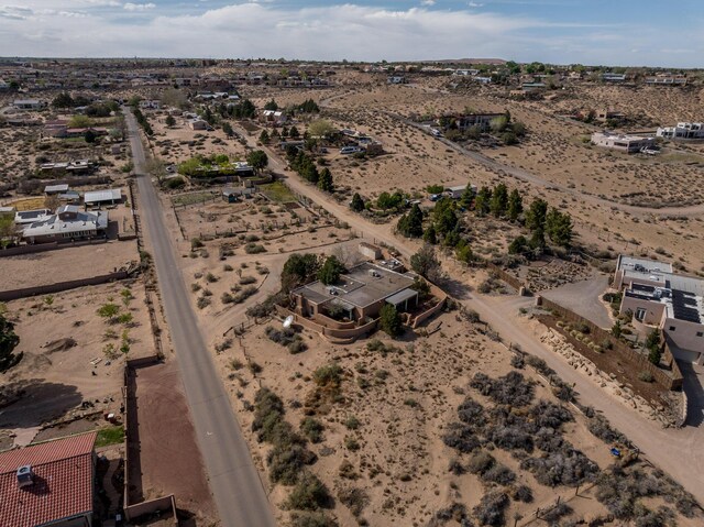 aerial view of property and surrounding area with a desert landscape and rural landscape