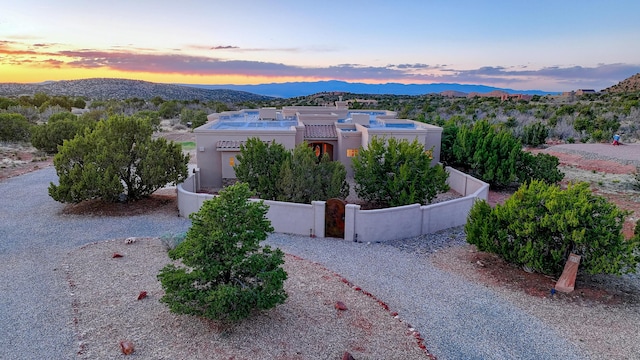 255 Diamond Tail Rd, Placitas, NM 87043 - view of front of property with a mountain view and stucco siding