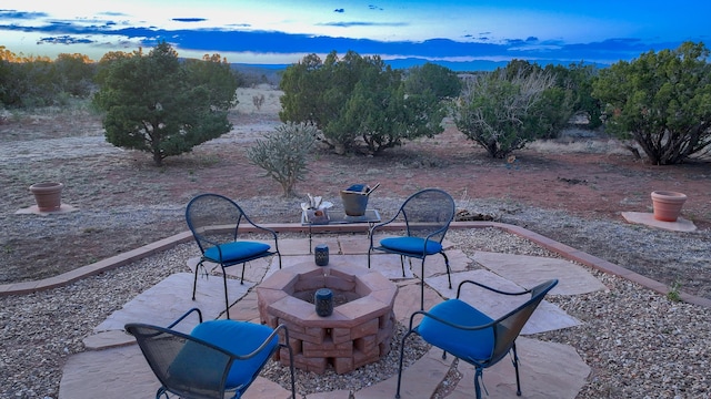 255 Diamond Tail Rd, Placitas, NM 87043 - view of patio featuring an outdoor fire pit