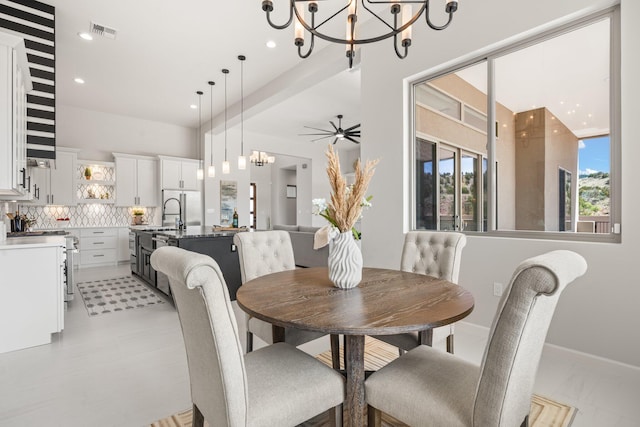 262 Diamond Tail Rd, Placitas, NM 87043 - dining space featuring visible vents, recessed lighting, and a notable chandelier