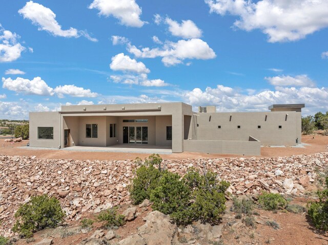 262 Diamond Tail Rd, Placitas, NM 87043 - rear view of property featuring a patio area and stucco siding