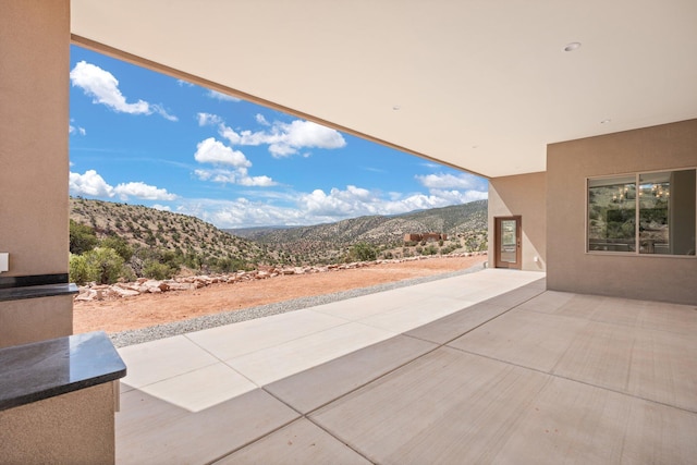 262 Diamond Tail Rd, Placitas, NM 87043 - view of patio with a mountain view