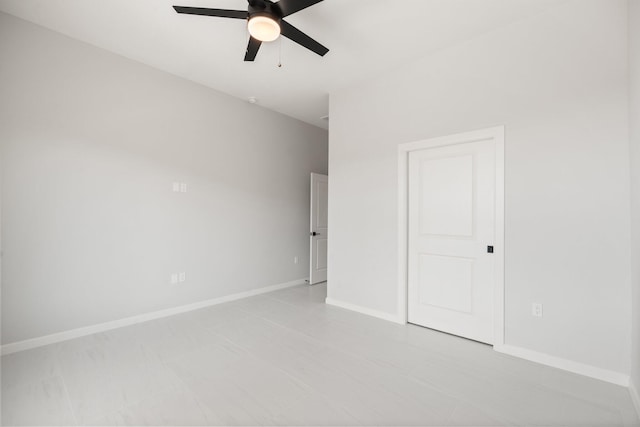 262 Diamond Tail Rd, Placitas, NM 87043 - spare room featuring baseboards and ceiling fan