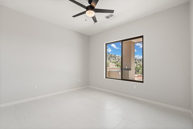 262 Diamond Tail Rd, Placitas, NM 87043 - empty room with baseboards, a ceiling fan, and visible vents