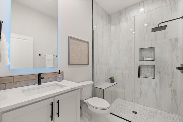 262 Diamond Tail Rd, Placitas, NM 87043 - bathroom featuring toilet, a marble finish shower, and vanity