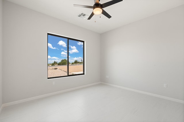 262 Diamond Tail Rd, Placitas, NM 87043 - spare room with a ceiling fan, baseboards, and visible vents