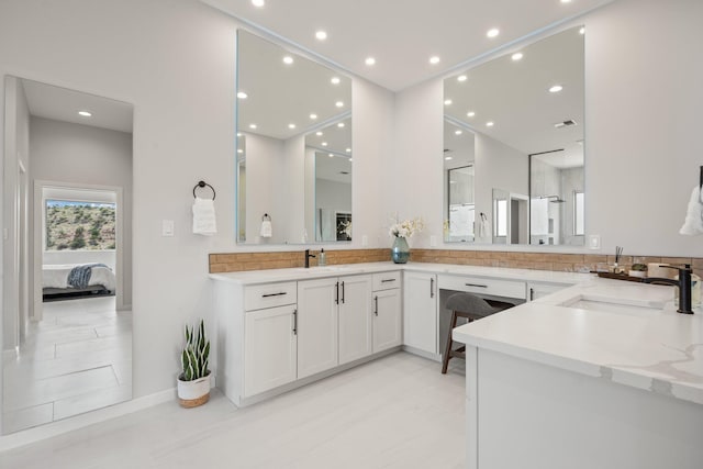 262 Diamond Tail Rd, Placitas, NM 87043 - ensuite bathroom with vanity, ensuite bathroom, baseboards, and recessed lighting