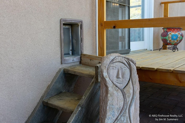 exterior details featuring stucco siding