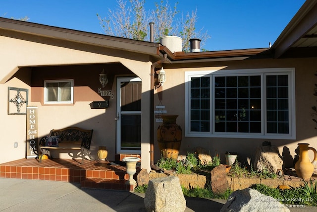 exterior space with stucco siding