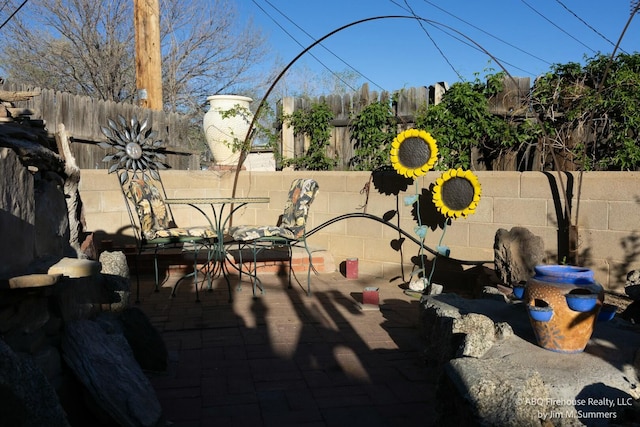 view of patio with fence
