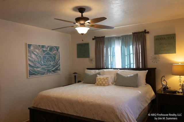 bedroom featuring ceiling fan