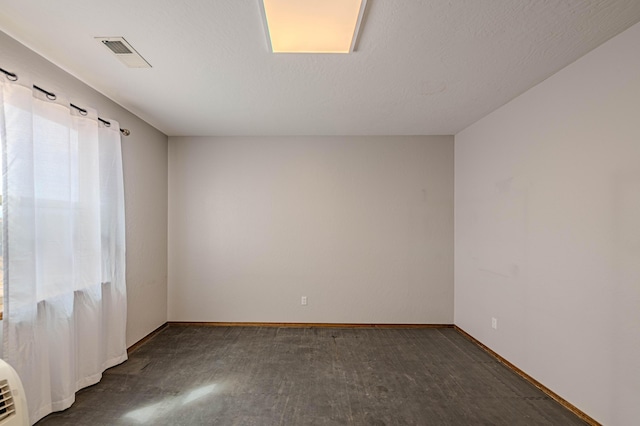 5016 Frontier Rd NE, Rio Rancho, NM 87144 - unfurnished room with visible vents and baseboards