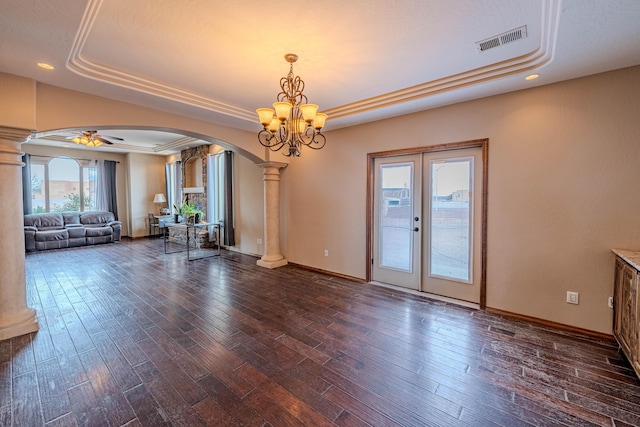 5016 Frontier Rd NE, Rio Rancho, NM 87144 - interior space featuring arched walkways, visible vents, ornate columns, and a tray ceiling