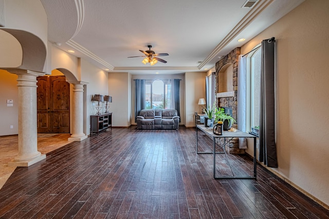 5016 Frontier Rd NE, Rio Rancho, NM 87144 - sitting room with decorative columns, hardwood / wood-style flooring, arched walkways, and a ceiling fan