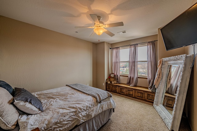5016 Frontier Rd NE, Rio Rancho, NM 87144 - bedroom featuring ceiling fan, visible vents, and light carpet