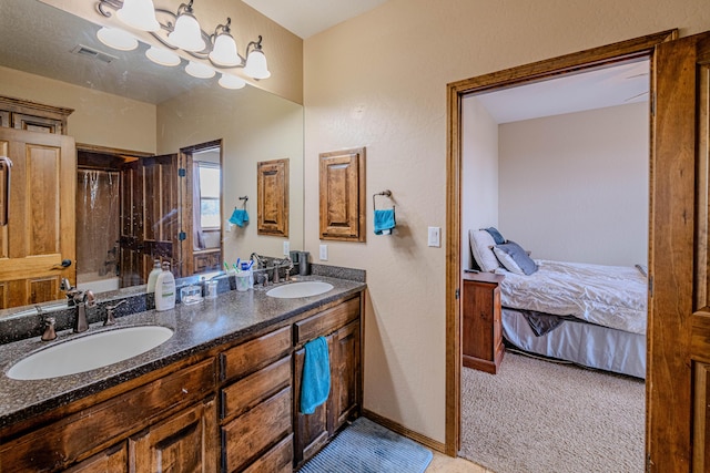 5016 Frontier Rd NE, Rio Rancho, NM 87144 - ensuite bathroom with a tub, visible vents, a sink, and double vanity