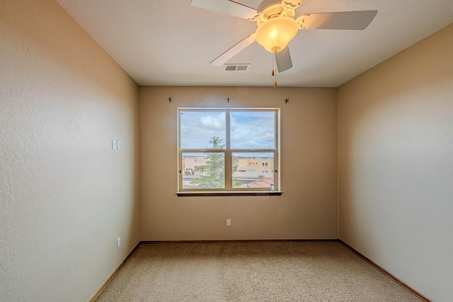 5016 Frontier Rd NE, Rio Rancho, NM 87144 - unfurnished room featuring ceiling fan, baseboards, carpet flooring, and visible vents