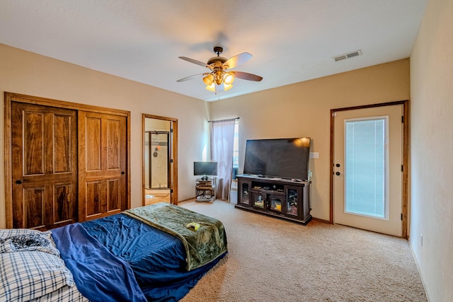 5016 Frontier Rd NE, Rio Rancho, NM 87144 - carpeted bedroom with baseboards, visible vents, a closet, and ceiling fan