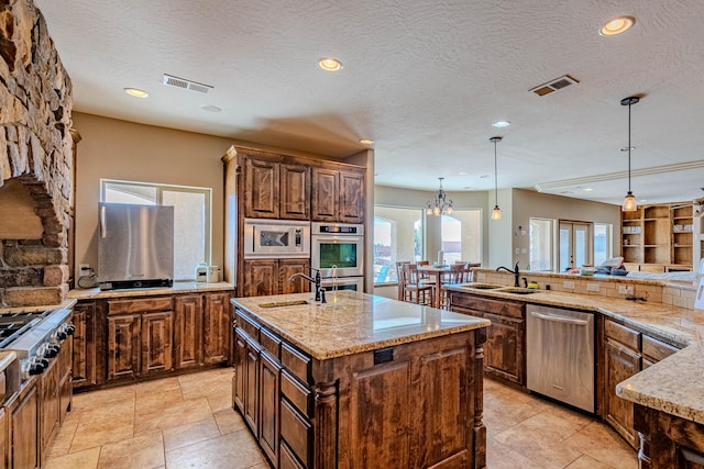 5016 Frontier Rd NE, Rio Rancho, NM 87144 - kitchen featuring recessed lighting, visible vents, stainless steel appliances, and a sink