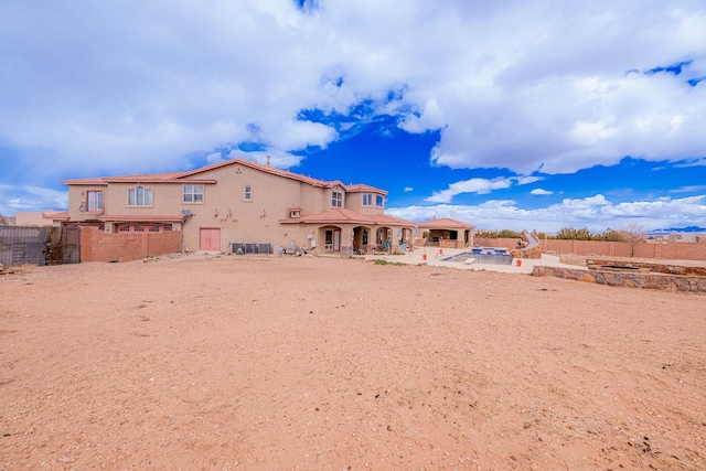 5016 Frontier Rd NE, Rio Rancho, NM 87144 - rear view of property with fence private yard, a patio, and stucco siding