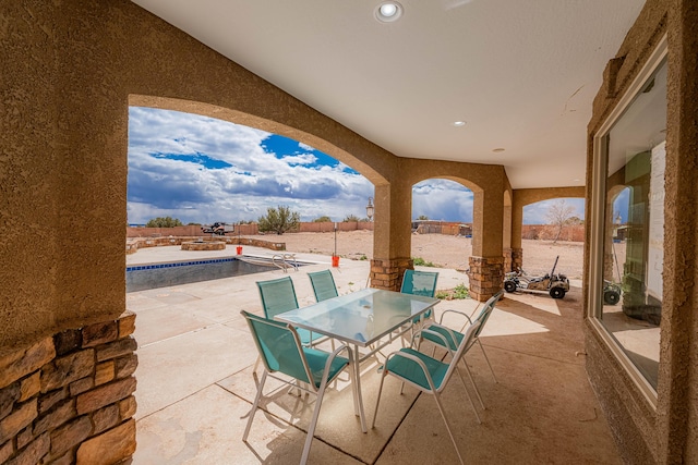 5016 Frontier Rd NE, Rio Rancho, NM 87144 - view of patio with an outdoor pool and outdoor dining area