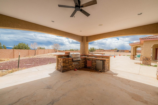5016 Frontier Rd NE, Rio Rancho, NM 87144 - view of patio / terrace with a fenced backyard, a ceiling fan, exterior kitchen, and area for grilling