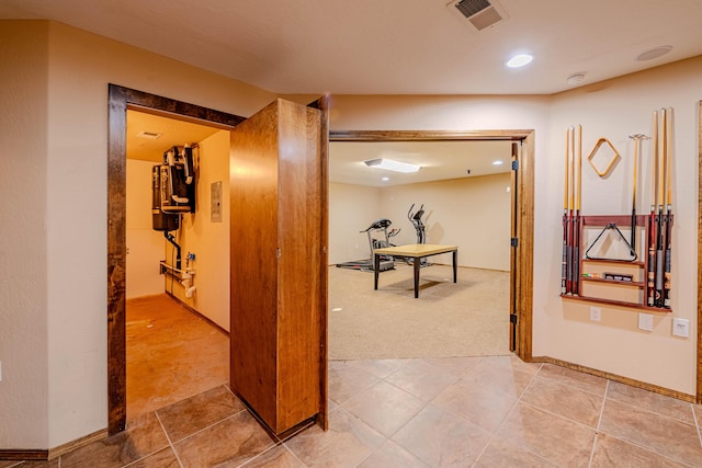 5016 Frontier Rd NE, Rio Rancho, NM 87144 - hall featuring recessed lighting, light carpet, visible vents, and light tile patterned floors