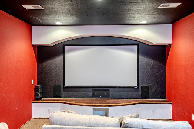 5016 Frontier Rd NE, Rio Rancho, NM 87144 - home theater with a textured wall, baseboards, visible vents, and carpet