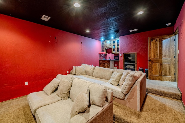 5016 Frontier Rd NE, Rio Rancho, NM 87144 - carpeted cinema room with a textured wall, visible vents, and recessed lighting
